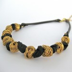 hagar-satat-knitted-ball-necklace-gold-brown